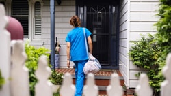 nurse holding bag - bag technique