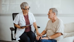 karnsofsky performance scale - hospice worker speaking with patient
