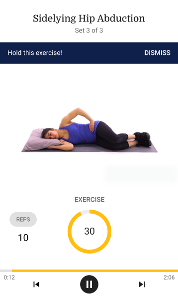 Woman doing a side-lying hip abduction with an app showing 10 reps and 30 seconds, highlighting digital healthcare by medbridge.