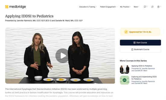Two presenters stand behind a table with food plates on a video titled 'Applying IDDSI to Pediatrics' from medbridge.