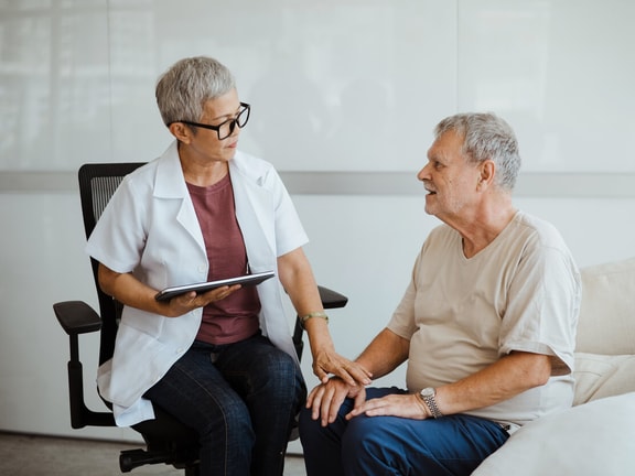 karnsofsky performance scale - hospice worker speaking with patient