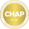 Gold circular CHAP seal reads "Community Health Accreditation Partner" and "Seal of Accreditation" around the edge.