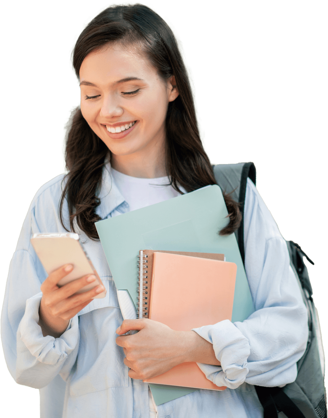 A person engaged in modern healthcare training, smiling at a smartphone while holding folders and a notebook, with a backpack.