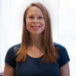A smiling person with long hair in a dark blue shirt represents digital healthcare, reflecting medbridge values.