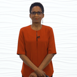 A person in a red blouse and glasses holds a digital healthcare device, with a white wave-patterned background, representing medbridge innovations.
