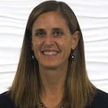 A woman with long brown hair smiles warmly, embodying digital healthcare innovation, against a white textured background.