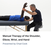 A therapist raises a patient's arm overhead during manual therapy, highlighting hybrid care offered by medbridge.
