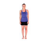 A woman in workout attire demonstrates a jumping jack exercise for medbridge.