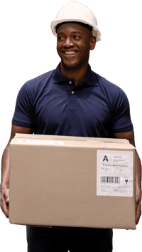Man in white hard hat and navy shirt smiles, holding a labeled box, showing reliable delivery for digital healthcare at medbridge.