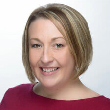 A smiling woman in a red top represents Medbridge's friendly digital healthcare innovations.