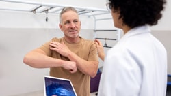 patient showing shoulder paint - empty can test - jobe test