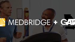 Two men talking with fitness equipment in front and medBridge and GATA logos visible.