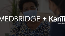 Two people sit and talk, with Medbridge and KanTime Healthcare Software logos overlaid.