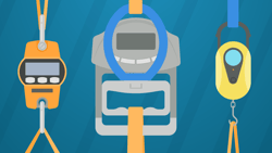 Digital hanging scales in orange, blue, and yellow with displays and hooks on a striped blue background.
