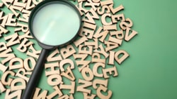 hospice abbreviations - magnifying glass with letters
