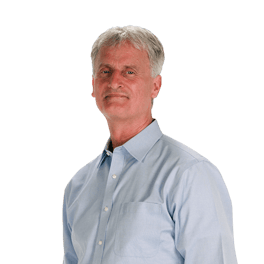 Gray-haired man in a light blue shirt on a plain background for medbridge.