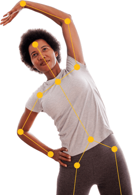 Individual stretches with right arm overhead, wearing gray shirt and dark pants; yellow dots and lines highlight body alignment in medbridge style.