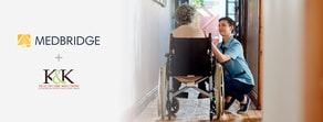 Healthcare worker kneeling by a person in a wheelchair with logos of medBridge and K&K Healthcare Solutions.