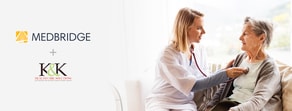 A healthcare worker examines an elderly woman with a stethoscope in a cozy room, featuring medBridge and K&K Healthcare Solutions logos on the left.