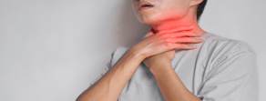 An individual in a gray shirt touches their throat, symbolizing pain, highlighting medbridge's hybrid care solutions.