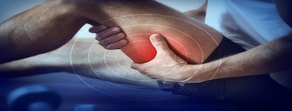 A person with calf pain highlighted by a red circle, illustrating Medbridge's role in patient care.