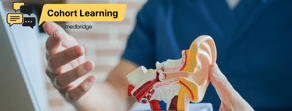 A person holds a human ear model with a "Cohort Learning" banner and medbridge logo visible.