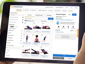 Tablet showing Medbridge fitness app with exercise options and workout planning.