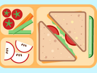 Lunchbox with triangle sandwiches, cucumbers, tomatoes, carrots, and apples on a light blue background.