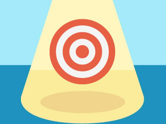 A spotlight shines on a target symbol against a blue background.