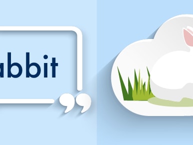 Word "Wabbit" in speech bubble and white rabbit in grass in thought bubble.