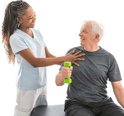 A woman helps an elderly man with a green dumbbell in a physical therapy session.