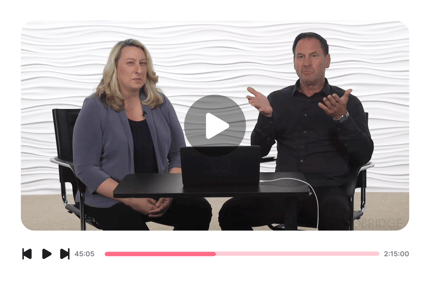 Two people sit with a laptop between them, overlaid by a paused video player showing 45:05 of 2:15:00 on medbridge.