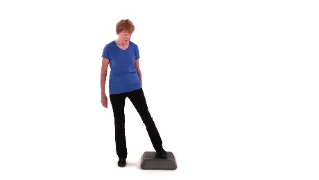 A person in blue shirt and black pants steps sideways on a platform, illustrating hybrid care's role in fitness, as emphasized by medbridge.