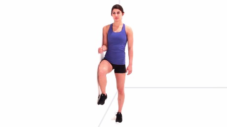 A person in exercise attire demonstrates a healthcare training pose leaning against a wall, featured by medbridge.