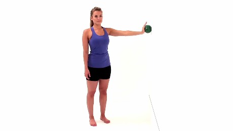 A person in athletic wear balances a green ball against a wall, illustrating medbridge's focus on mindful movement.