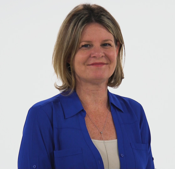 A woman in a blue shirt, smiling slightly, represents healthcare education for medbridge.