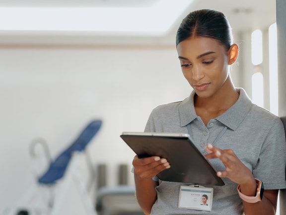 pt on tablet - digital healthcare technology