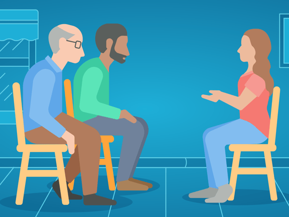 Three people sitting on chairs in an indoor Medbridge setting.