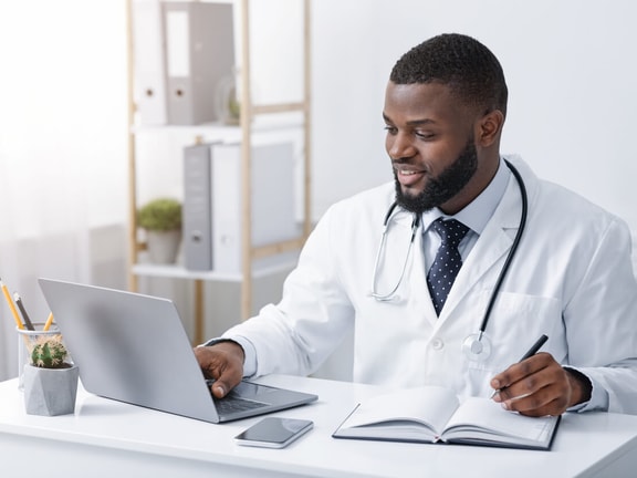 doctor on computer - minimal clinically important difference