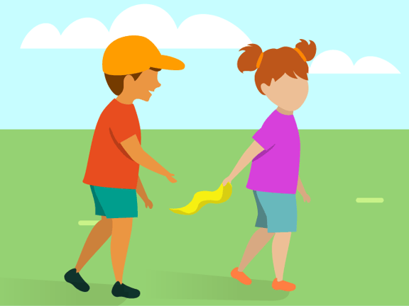 A boy in orange playfully tugs a yellow ribbon from a girl's pink shirt in a grassy field.