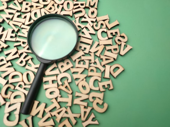 hospice abbreviations - magnifying glass with letters