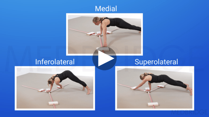 A woman in workout clothes does plank reach tests on a marked mat, demonstrating a medbridge healthcare training method.