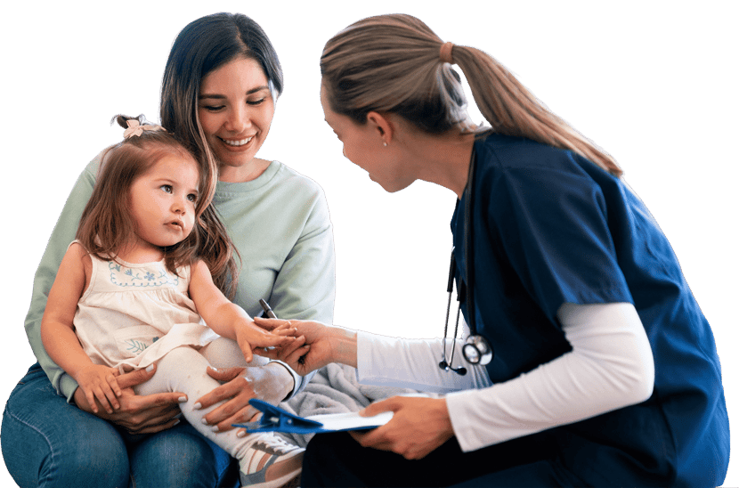 A provider uses Medbridge hybrid care to examine a child on her mother’s lap.